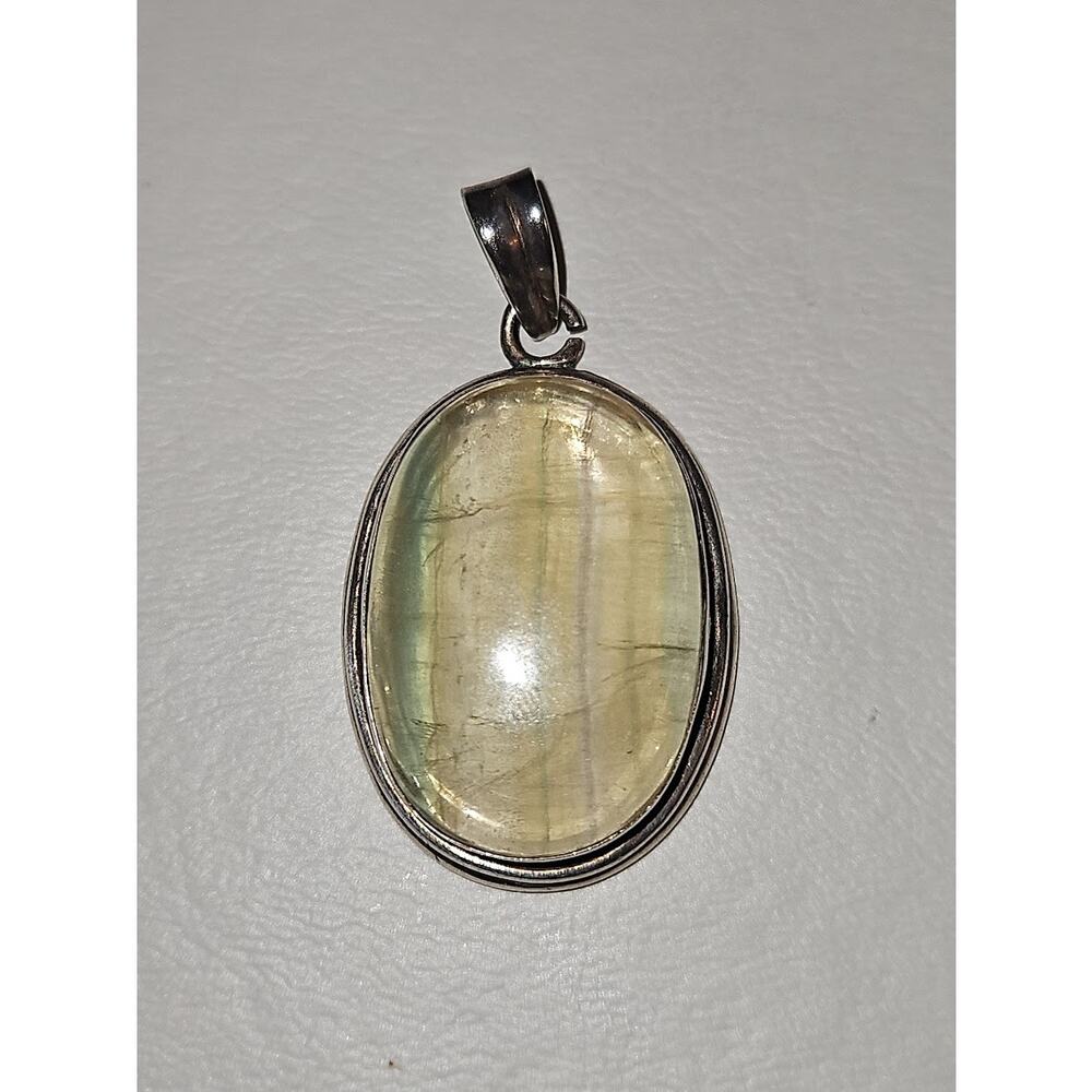 Natural Green Rutilated Quartz Pendant set in sterling silver, handmade.